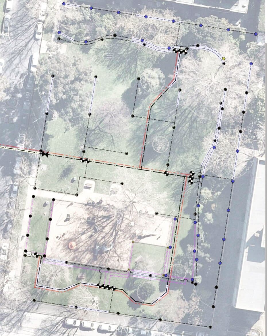 Aerial-based irrigation design plan showing mainline routes and sprinkler positions overlaid on the physical park